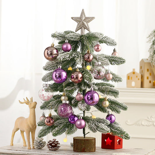 A miniature LED Christmas Tree Decoration Featuring White Flocking Cedar Tree with Purple Ornaments, and a Set of Holiday Tabletop Ornaments