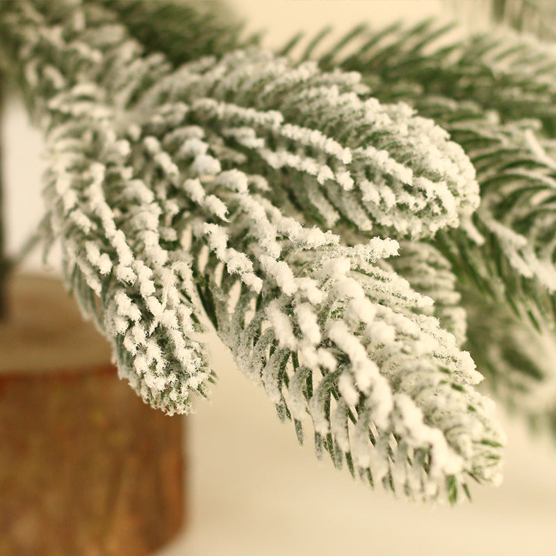 A miniature LED Christmas Tree Decoration Featuring White Flocking Cedar Tree with Purple Ornaments, and a Set of Holiday Tabletop Ornaments